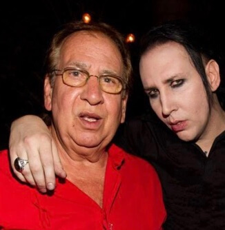 Hugh Angus Warner with his son, Marilyn Manson.